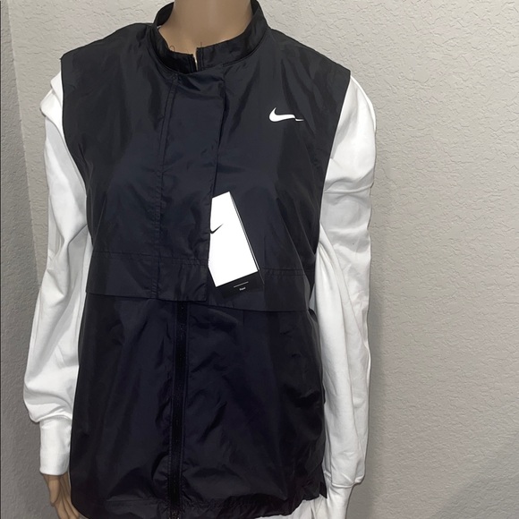 Nike Jackets & Blazers - Nike Women's Black Sleeveless Vest